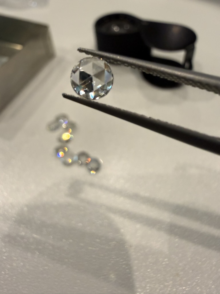 Diamond being inspected under loupe at Bangkok Bespoke Jewelry
